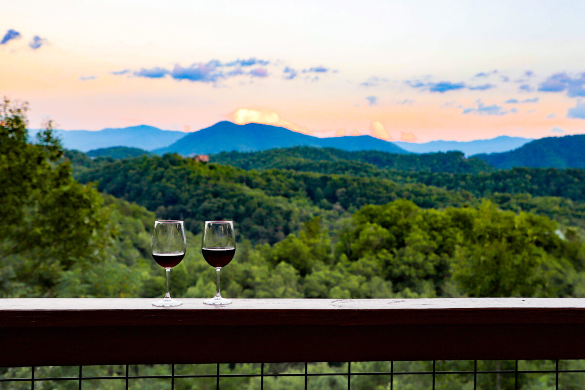 Wineglasses overlooking mountains